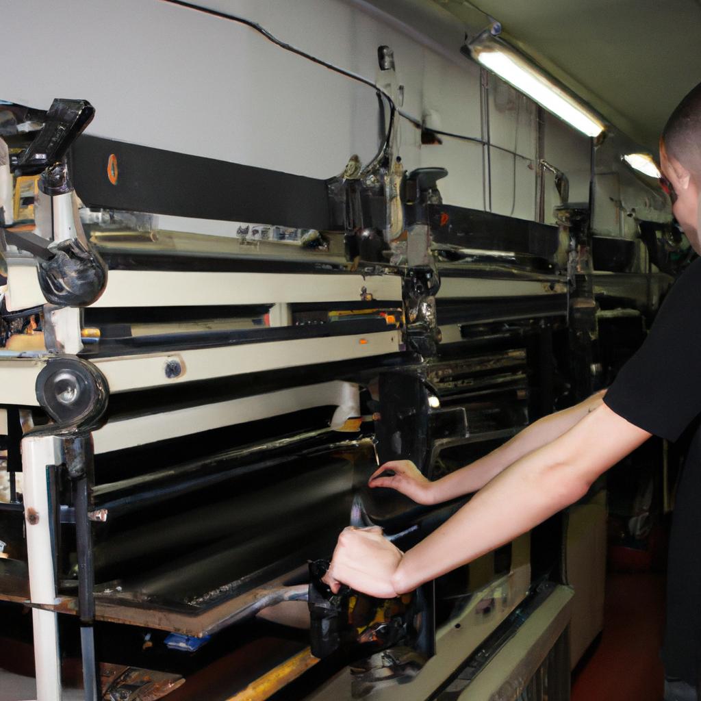 Person working at printing press